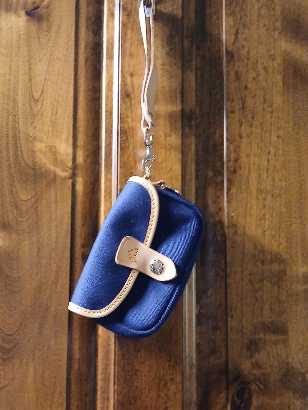Dooney & Bourke Navy and Tan Wristlet Crossbody